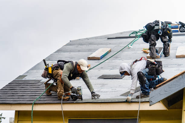 Professional Storm Damage Roof Repair technician working in Goshen, NY